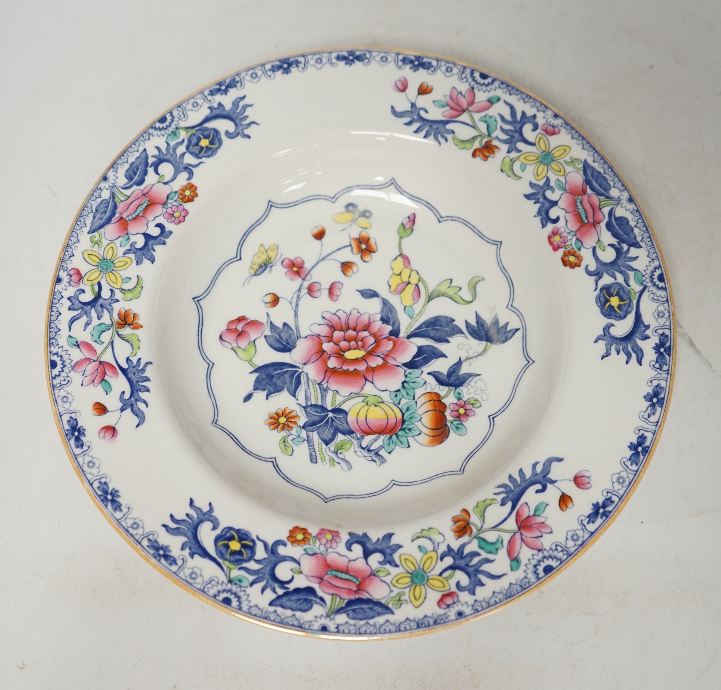 Spode Copeland dinner ware, comprising an oval and a rectangular meat dish and six plates, each painted with peonies and other flowers, largest 43cm wide (8). Condition - poor